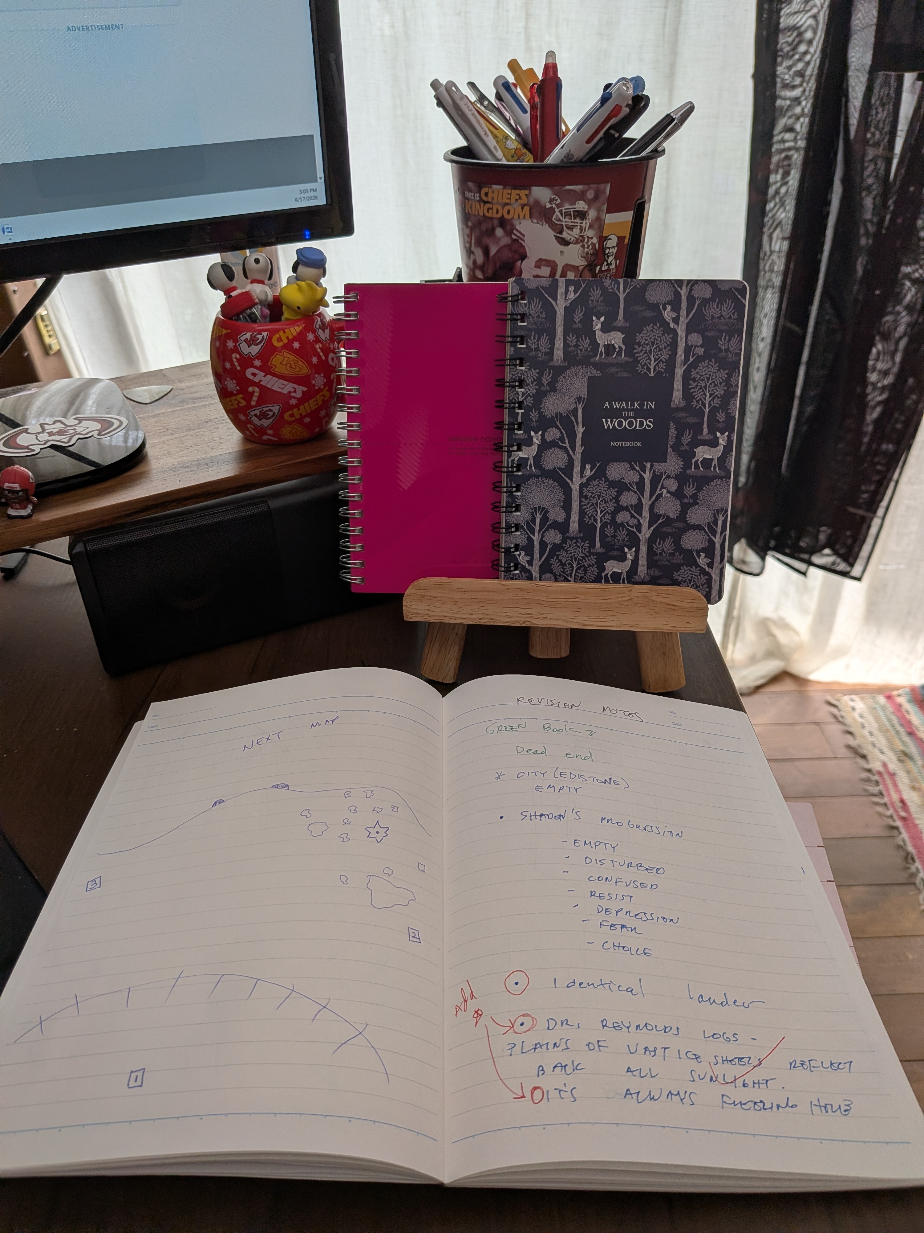 An open notebook showing revision notes and a map sketch for The Emotion Engine